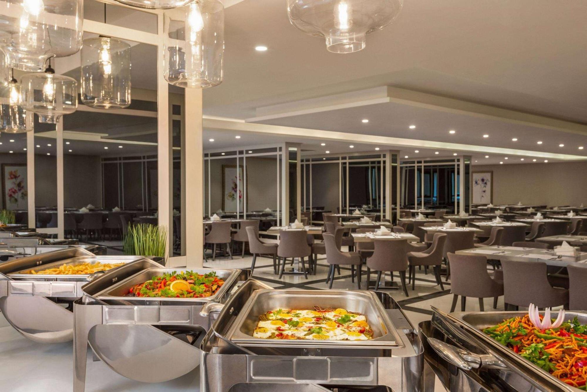 Ramada By Wyndham Makkah Zad Al Tayseer مكة المظهر الخارجي الصورة